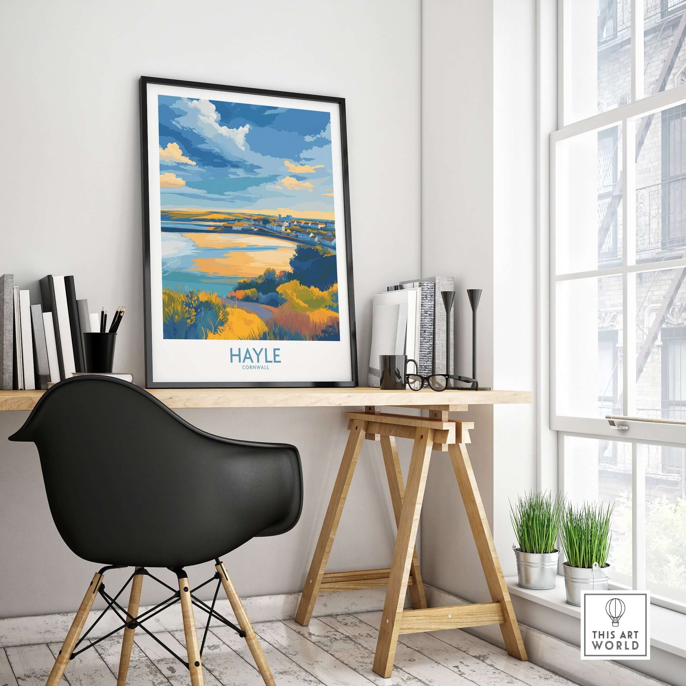 Hayle Estuary Panorama Wall Art - Cornish Travel Poster displayed on a desk in a modern workspace.