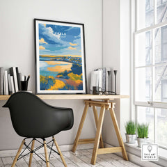 Hayle Cornwall Poster - UK Coastal Landscape Print framed on a desk in a modern room with a stylish chair.