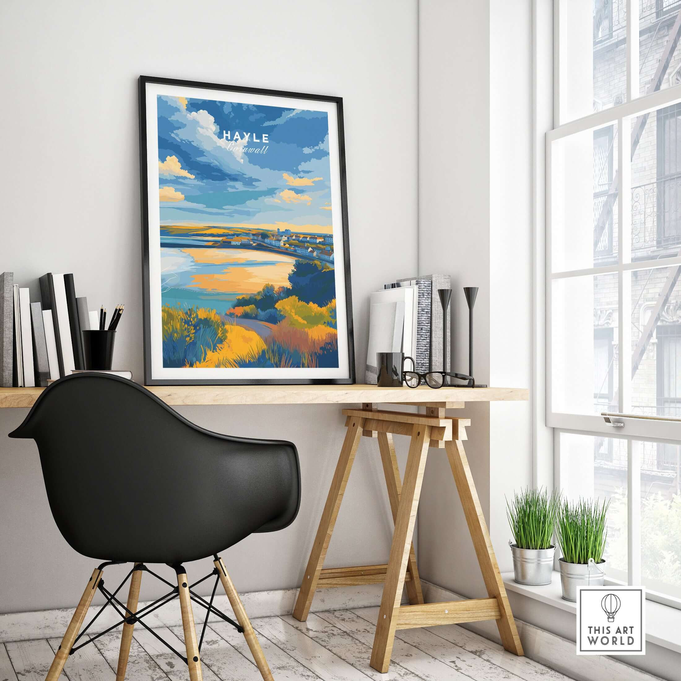 Hayle Cornwall Poster - UK Coastal Landscape Print framed on a desk in a modern room with a stylish chair.