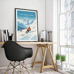 Les Deux Alpes poster displayed in a stylish home office, featuring vibrant ski imagery and a modern desk setup.