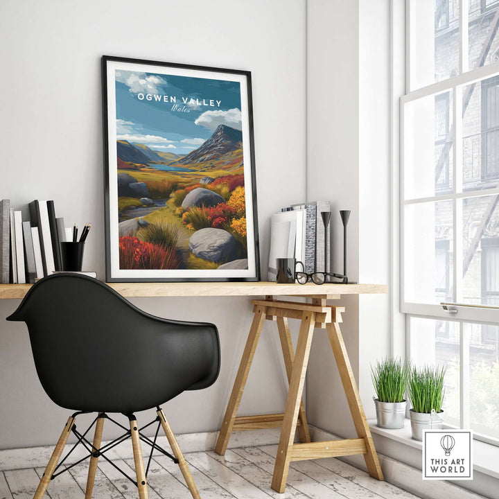 Ogwen Valley Wales print showcasing colorful highland landscape in modern office decor, featuring a stylish black chair.