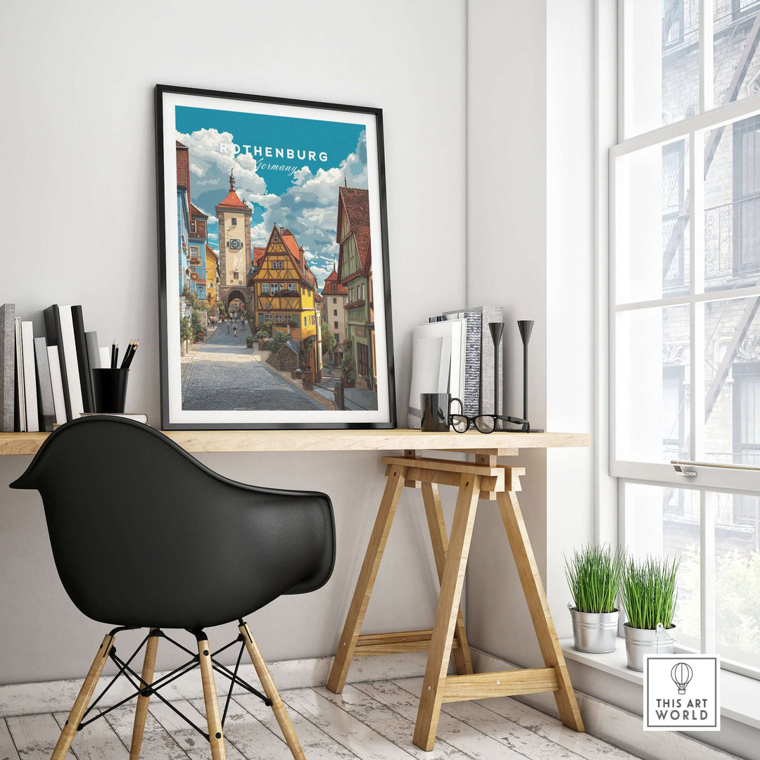 Rothenburg travel poster displayed in a stylish office setting, showcasing medieval architecture and cobblestone streets.