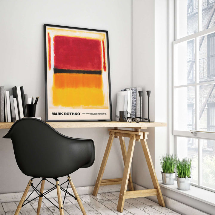 Mark Rothko Violet Black Orange Yellow 1949 art print displayed on a modern desk in a stylish workspace.