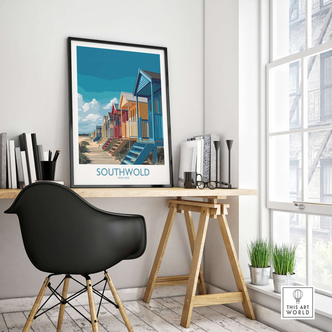Southwold England seaside poster featuring colorful beach huts in a stylish home office setting.