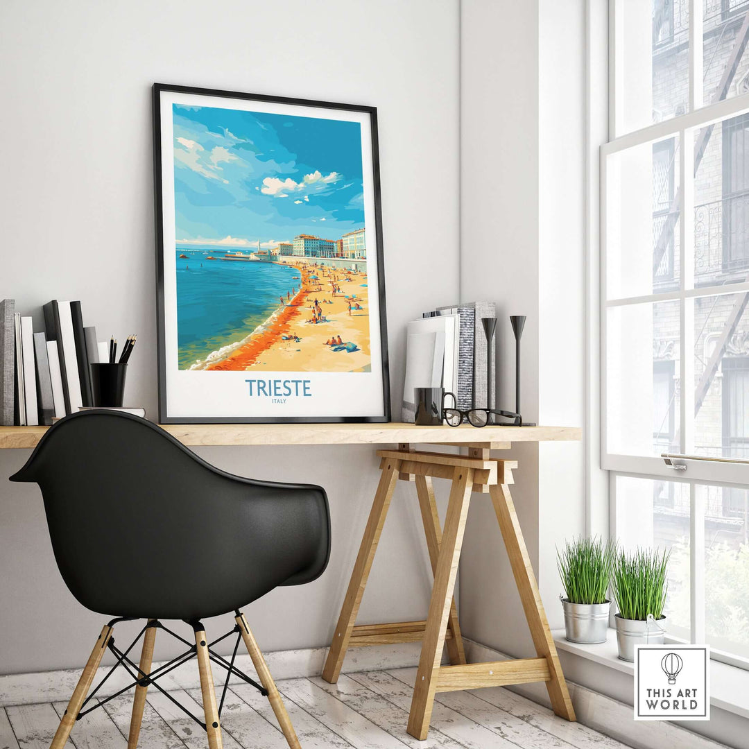 Trieste Italy poster displayed in a modern workspace, showcasing the city's beach and architecture.