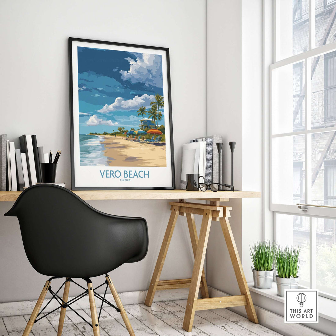 Vero Beach poster featuring beach umbrellas and loungers, showcasing Florida vacation decor in a stylish workspace.