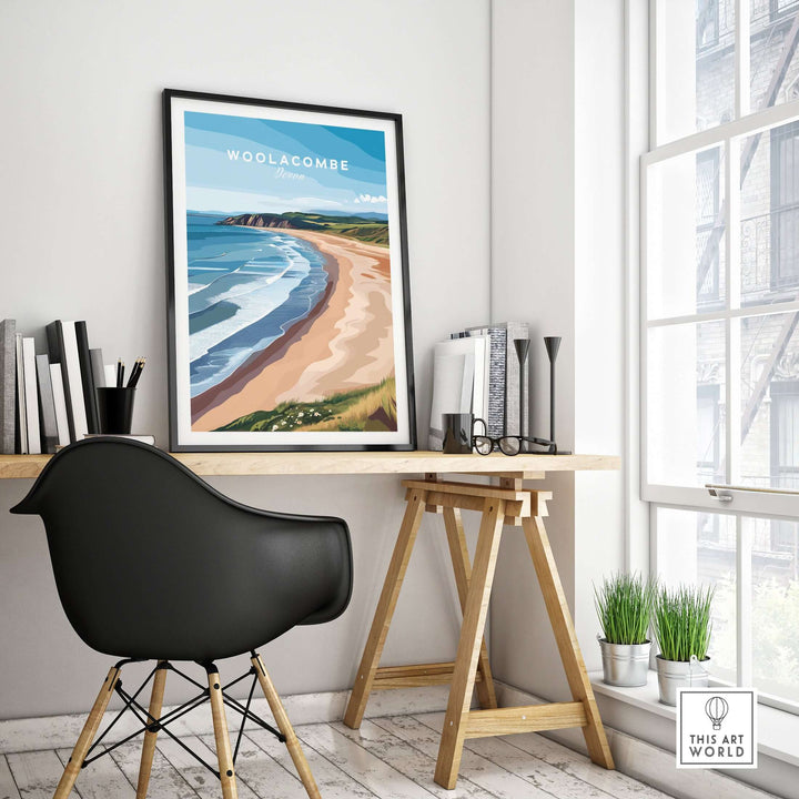 Woolacombe Devon Long Beach Sunset Poster displayed in a stylish workspace, showcasing a vibrant coastal scene.