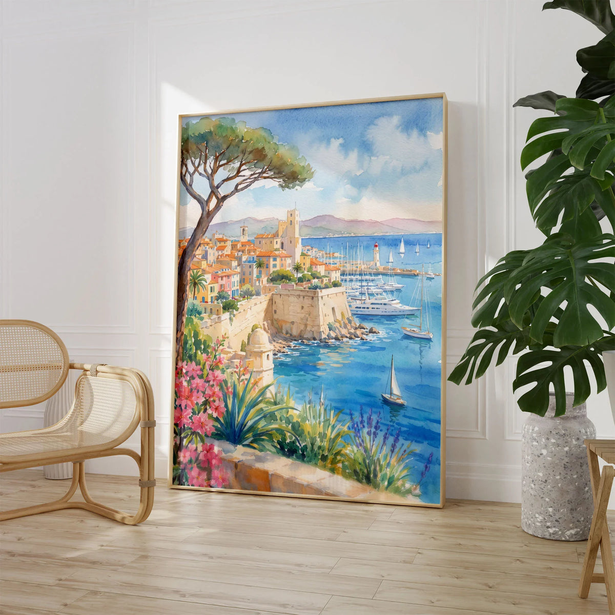 Antibes old town ramparts and harbour watercolour art print large framed print beside a chair and plant