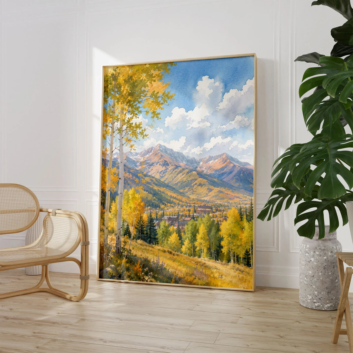 Aspen golden aspen trees and mountains watercolour art print large framed print beside a chair and plant
