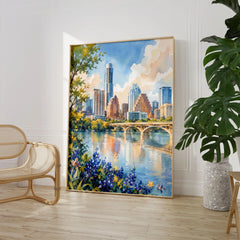 Austin skyline and Lady Bird Lake watercolour art print large framed print beside a chair and plant