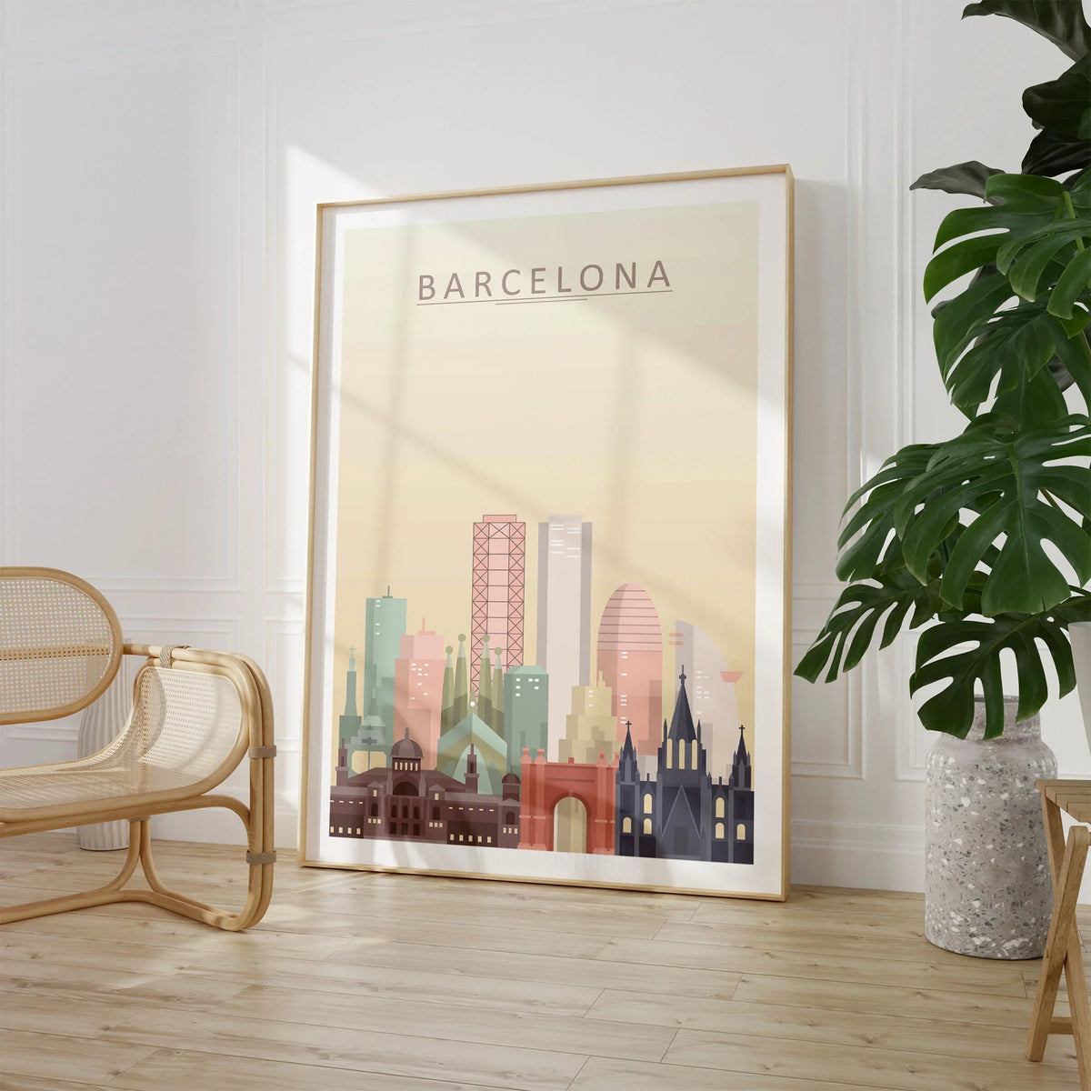 Barcelona city skyline art print, large framed print beside a chair and plant