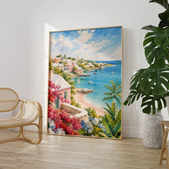 Bermuda pastel cottages and turquoise bay watercolour art print large framed print beside a chair and plant