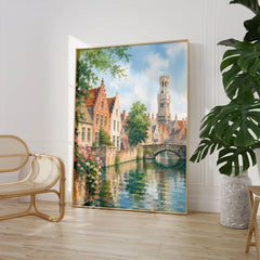Bruges canal and Belfry tower watercolour art print large framed print beside a chair and plant