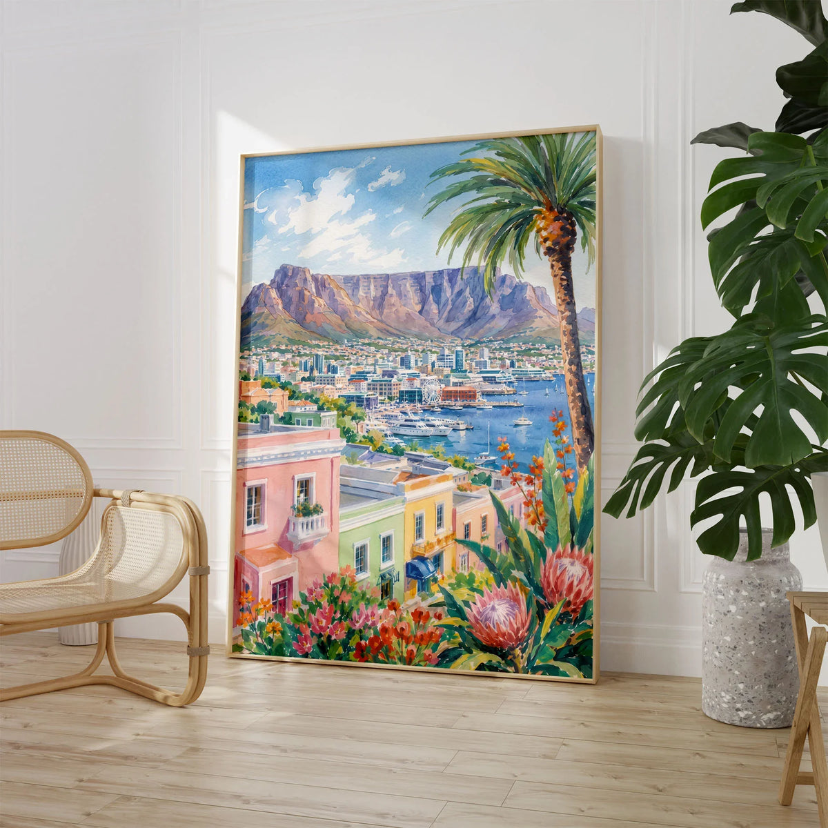 Cape Town Table Mountain and colourful houses watercolour art print large framed print beside a chair and plant