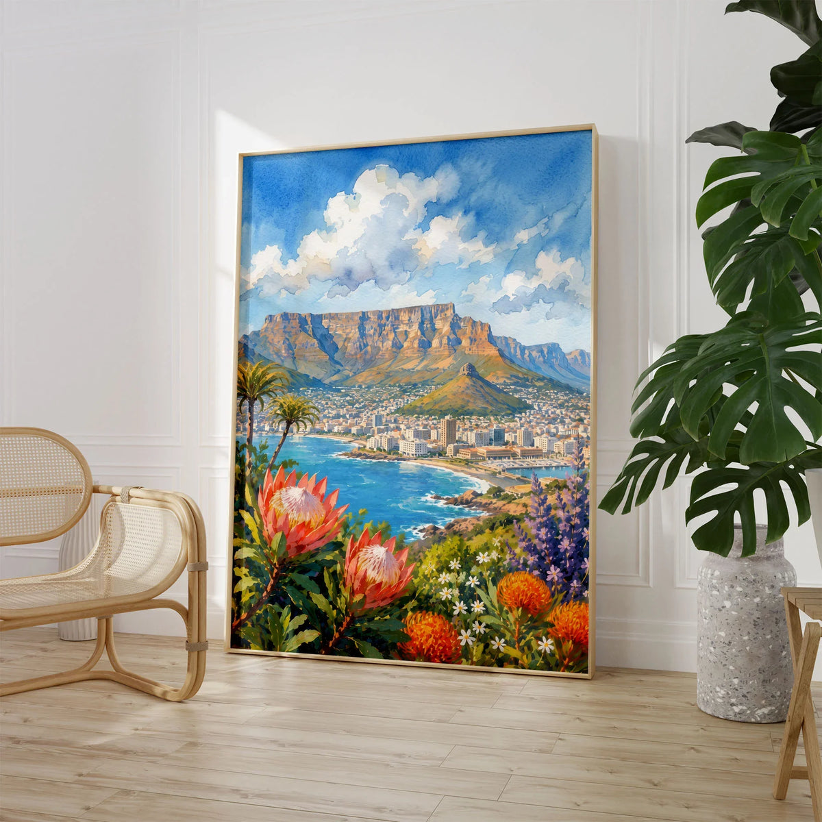 Cape Town Table Mountain bay with proteas watercolour art print large framed print beside a chair and plant