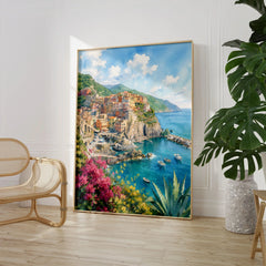 Cinque Terre Manarola cliff village watercolour art print large framed print beside a chair and plant