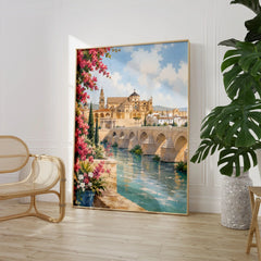 Córdoba Roman bridge and Mezquita watercolour art print large framed print beside a chair and plant