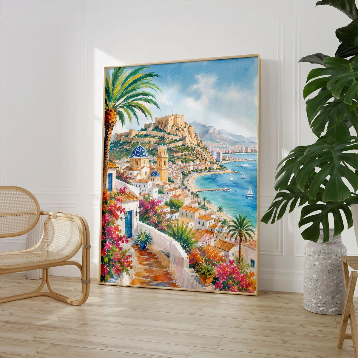 Costa Blanca Altea blue-domed church and coast watercolour art print large framed print beside a chair and plant