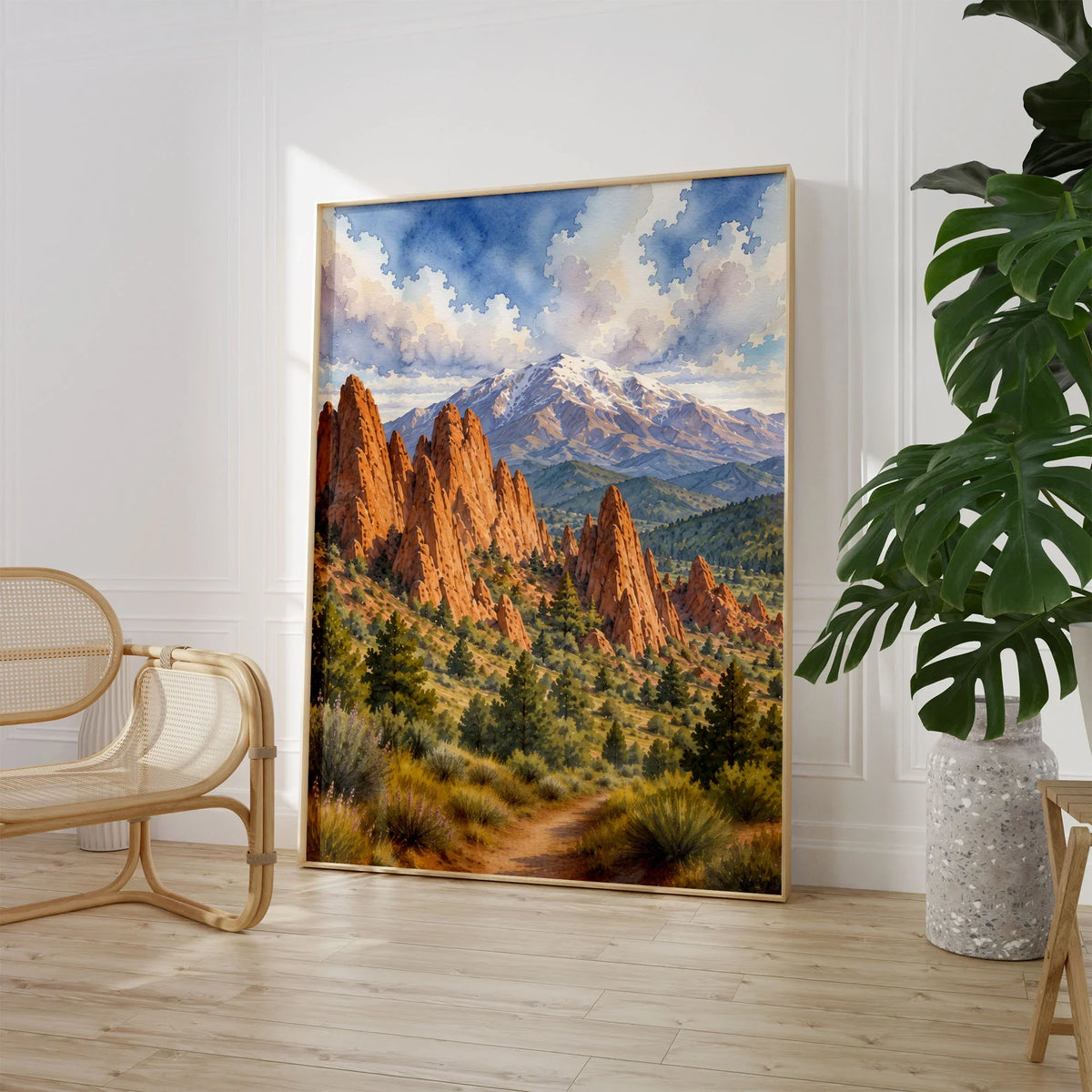 Garden of the Gods red rocks and Pikes Peak watercolour art print large framed print beside a chair and plant