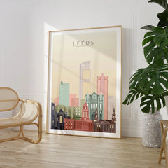 Leeds city skyline art print, large framed print beside a chair and plant