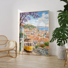 Lisbon yellow tram and castle watercolour art print large framed print beside a chair and plant