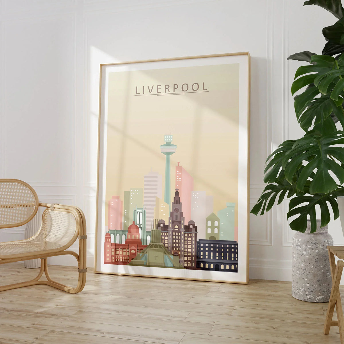 Liverpool city skyline art print, large framed print beside a chair and plant