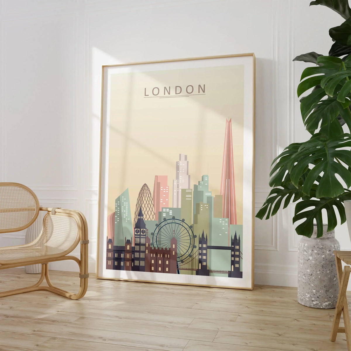 London city skyline art print, large framed print beside a chair and plant
