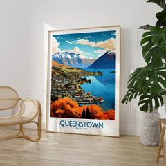 Queenstown New Zealand Lake Wakatipu in autumn modern travel poster, large framed print beside a chair and plant