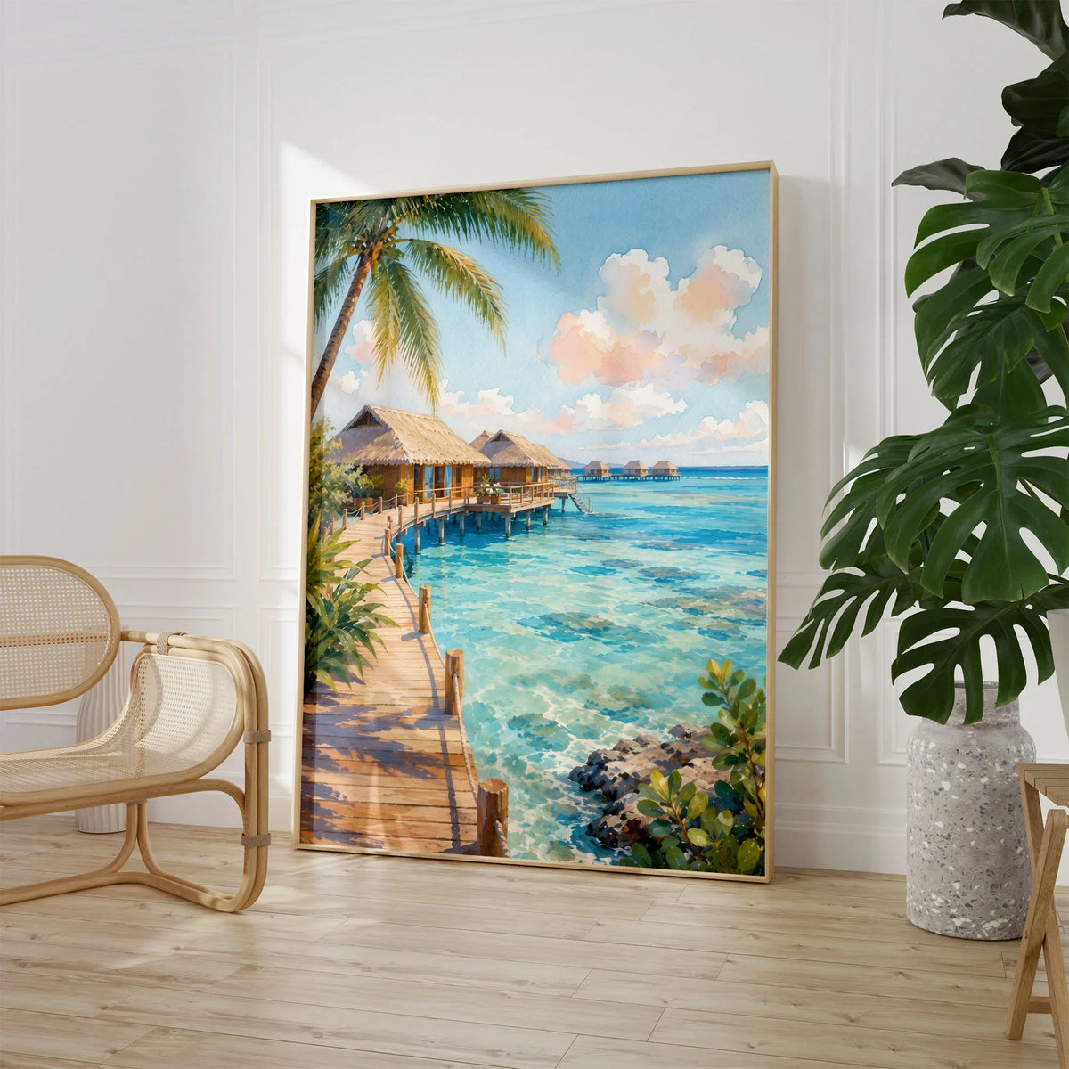 Maldives overwater villas and lagoon watercolour art print large framed print beside a chair and plant