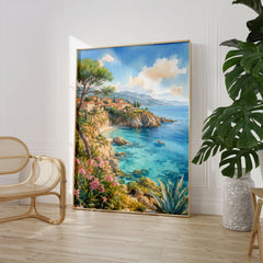 Mallorca turquoise cove and pines watercolour art print large framed print beside a chair and plant