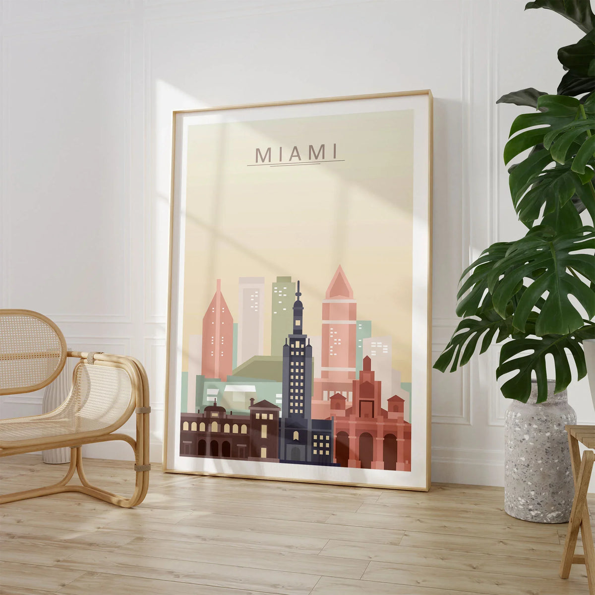 Miami city skyline art print, large framed print beside a chair and plant