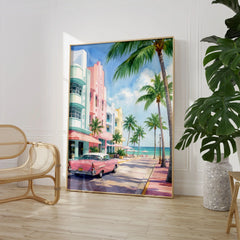 Miami Art Deco Ocean Drive and classic car watercolour art print large framed print beside a chair and plant