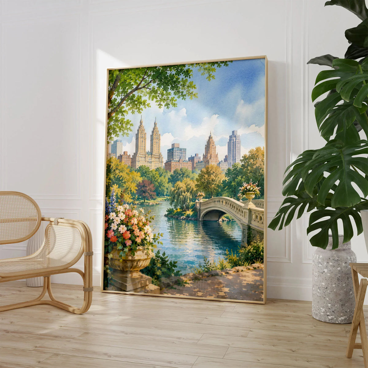 New York Central Park Bow Bridge watercolour art print large framed print beside a chair and plant