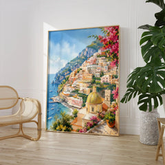 Positano cliffside village and church dome watercolour art print large framed print beside a chair and plant