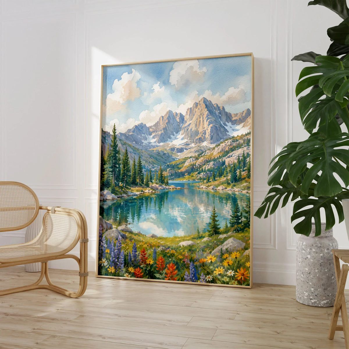 Rocky Mountain National Park alpine lake below rugged peaks watercolour art print large framed print beside a chair and plant