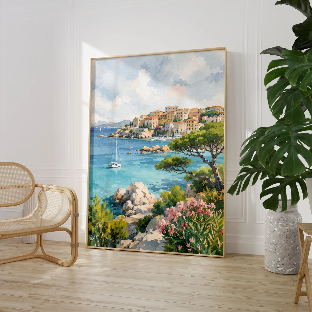 Sardinia turquoise coves and harbour town watercolour art print large framed print beside a chair and plant