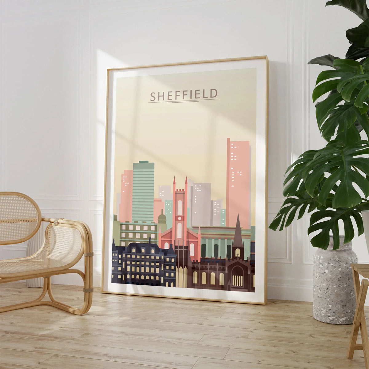 Sheffield city skyline art print, large framed print beside a chair and plant