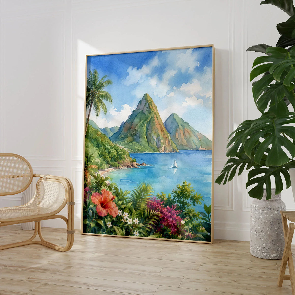 St Lucia the Pitons and bay watercolour art print large framed print beside a chair and plant