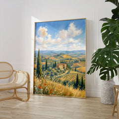 Tuscany rolling hills and cypress trees watercolour art print large framed print beside a chair and plant