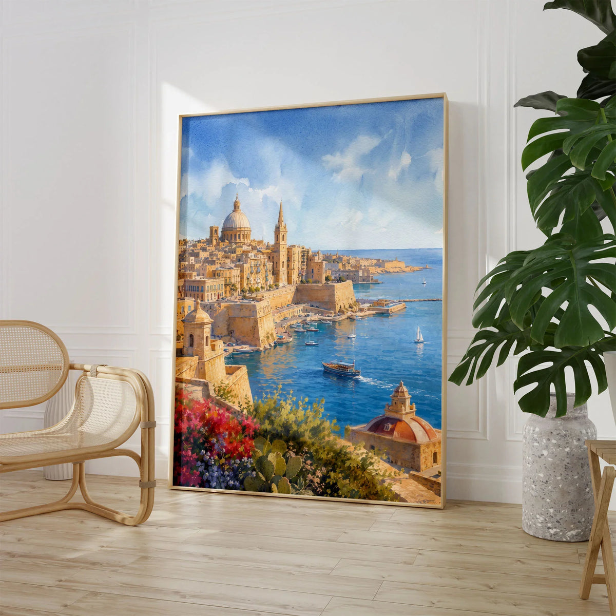 Valletta Grand Harbour and domes watercolour art print large framed print beside a chair and plant