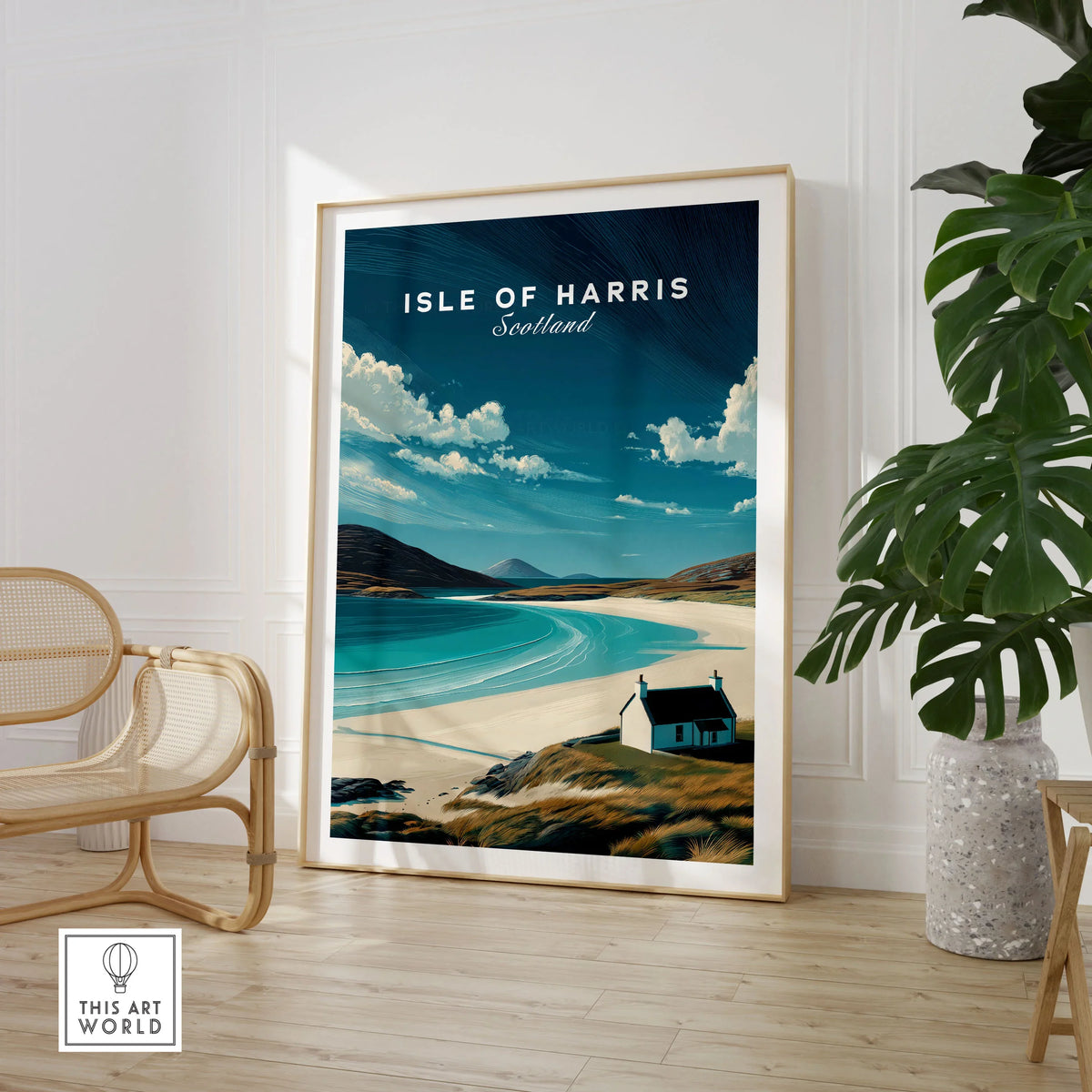 Isle of Harris Scotland Beach House Seascape Poster - Remote Scottish Isle Print in a large natural wood frame leaning in a room with a rattan chair and monstera plant