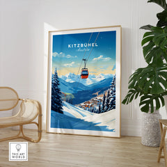 Kitzbuhel Art Print in a large natural wood frame leaning in a room with a rattan chair and monstera plant