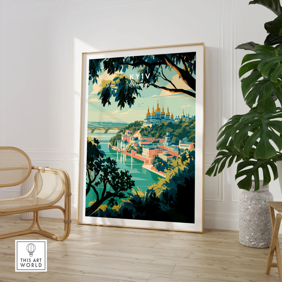 Kyiv Ukraine Golden Domes Travel Poster — golden domes on a wooded bluff above the Dnipro river, shown as large framed print room setting chair plant
