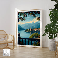 Lake Maggiore Travel Poster in a large natural wood frame leaning in a room with a rattan chair and monstera plant