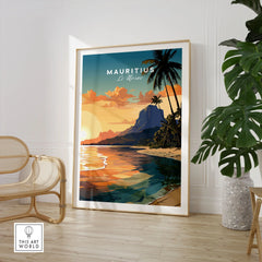 Le Morne Mauritius Poster in a large natural wood frame leaning in a room with a rattan chair and monstera plant