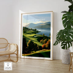 Loch Lomond Scotland Autumn Lochside Travel Poster — autumn slopes rolling down to Loch Lomond with Highland hills beyond, shown as large framed print room setting chair plant