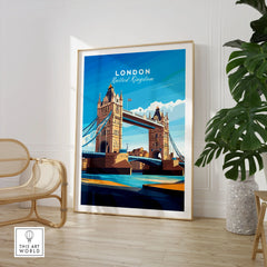 London Print England in a large natural wood frame leaning in a room with a rattan chair and monstera plant
