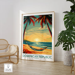 Dominican Republic Wall Art in a large natural wood frame leaning in a room with a rattan chair and monstera plant