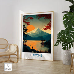 Hakone Japan Wall Art Lake Ashi Print - Japanese Spiritual Poster in a large natural wood frame leaning in a room with a rattan chair and monstera plant