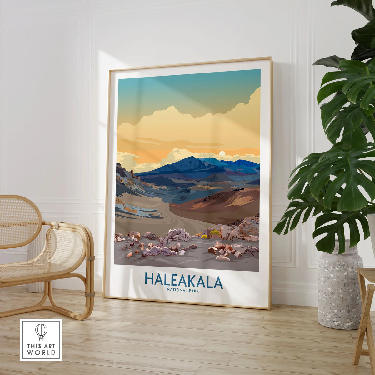 Haleakalā National Park Print, Hawaiian Volcano Poster, Sunset Wall Decor in a large natural wood frame leaning in a room with a rattan chair and monstera plant